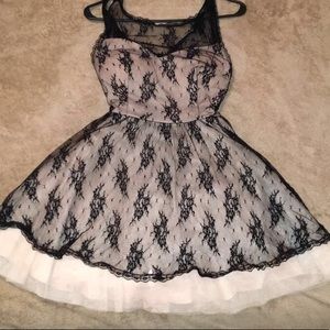 B. Smart cream and black lace formal dress